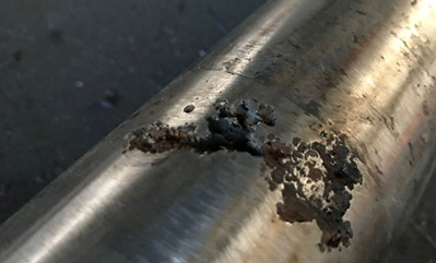 Atrolytic corrosion of a stainless steel shaft